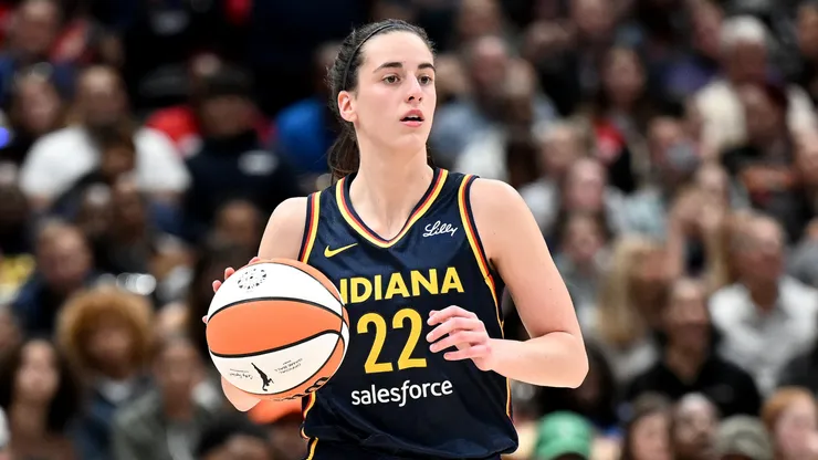 Caitlin Clark #22 of the Indiana Fever handles the ball against the Washington Mystics