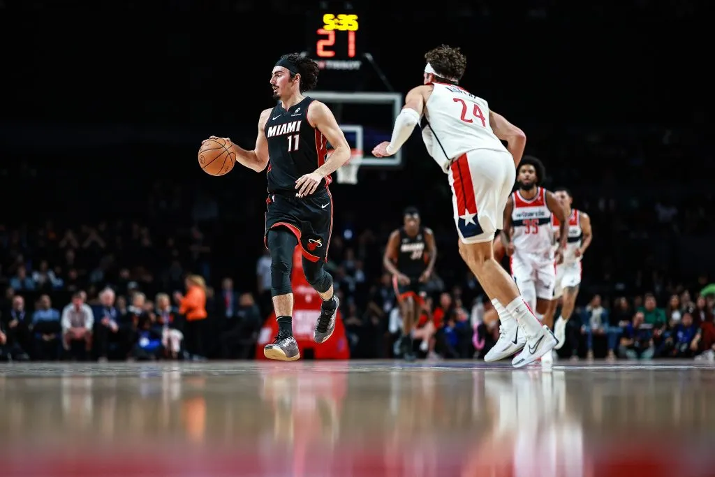 Jaime Jaquez Jr. #11 of the Miami Heat drives against Corey Kispert #24 of the Washington Wizards during the second half of the game at Arena Ciudad de Mexico. Manuel Velasquez/Getty Images