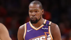 Kevin Durant #35 of the Phoenix Suns reacts with Ryan Dunn #0 after scoring against the Dallas Mavericks during the NBA game at Footprint Center on October 26, 2024 in Phoenix, Arizona. The Suns defeated the Mavericks 114-102.