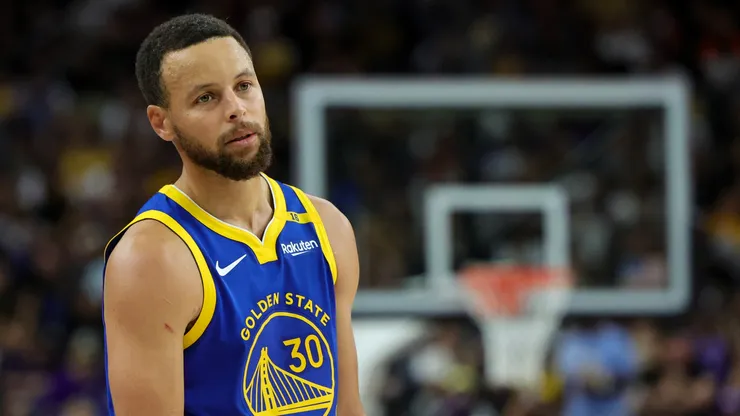 Stephen Curry #30 of the Golden State Warriors stands on the court during a break in the fourth quarter of a preseason game