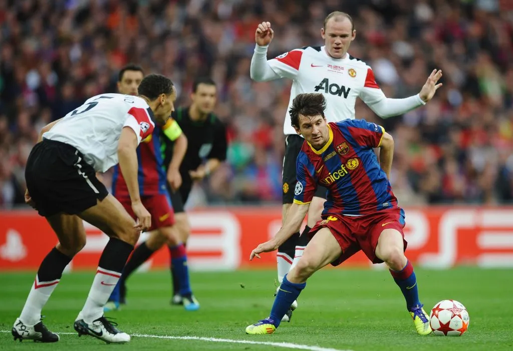 Lionel Messi of FC Barcelona in action against Rio Ferdinand  and Wayne Rooney of Manchester United during the UEFA Champions League final between FC Barcelona and Manchester United FC at Wembley Stadium. Laurence Griffiths/Getty Images