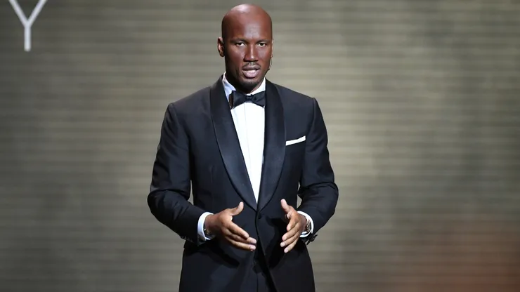 Didier Drogba speaks on stage during the Ballon D'Or ceremony at Theatre Du Chatelet In Paris