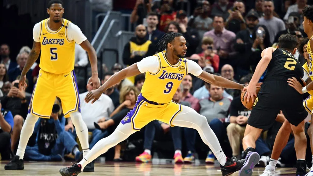 Bronny James #9 of the Los Angeles Lakers guards Ty Jerome #2 of the Cleveland Cavaliers during the fourth quarter at Rocket Mortgage Fieldhouse on October 30, 2024 in Cleveland, Ohio.  (Photo by Jason Miller/Getty Images)