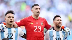 Lautaro Martinez, Emiliano Martinez and Lionel Messi of Argentina sing the national anthem prior to the FIFA World Cup Qatar 2022 Group C match between Argentina and Saudi Arabia at Lusail Stadium on November 22, 2022 in Lusail City, Qatar.
