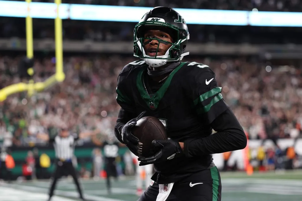 EAST RUTHERFORD, NEW JERSEY ā OCTOBER 31: Garrett Wilson #5 of the New York Jets celebrates a touchdown during the fourth quarter against the Houston Texans at MetLife Stadium on October 31, 2024 in East Rutherford, New Jersey. (Photo by Luke Hales/Getty Images)