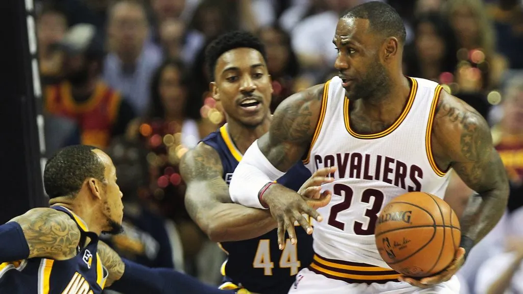 Cleveland, OH, USA - Cleveland Cavaliers forward LeBron James is guarded by Indiana Pacers guard Jeff Teague, center, and Indiana Pacers guard Monta Ellis, left, during the first quarter in Game 2 of an Eastern Conference playoff game on Monday, April 17, 2017, at Quicken Loans Arena in Cleveland, Ohio.