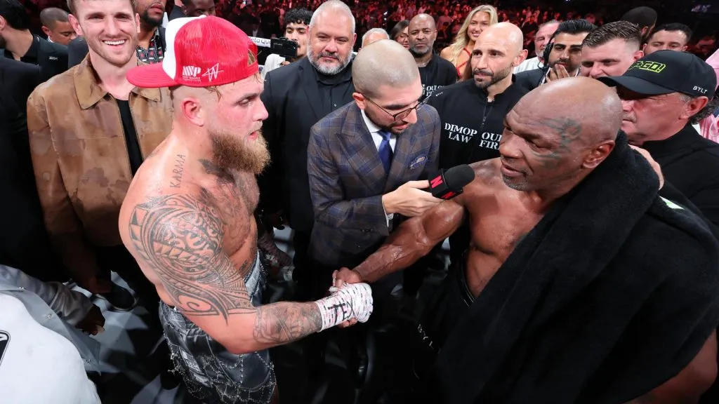 L-R) Jake Paul announced as winner against Mike Tyson during LIVE On Netflix: Jake Paul vs. Mike Tyson at AT&amp;T Stadium on November 15, 2024 in Arlington, Texas. (Photo by Al Bello/Getty Images for Netflix © 2024)