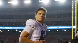 Oregon Ducks quarterback Dillon Gabriel (8) runs off the field after the NCAA Football game between the Oregon Ducks and the Wisconsin Badgers at Camp Randall Stadium in Madison, WI.