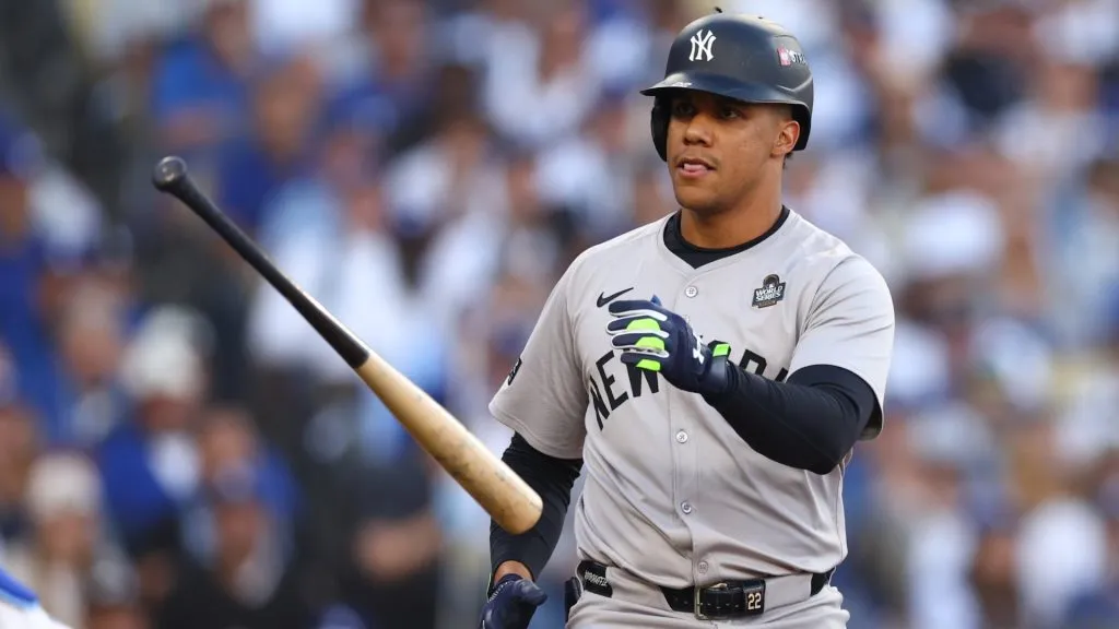 Juan Soto #22 of the New York Yankees tosses his bat after drawing a walk in the first inning against the Los Angeles Dodgers during Game One of the 2024 World Series at Dodger Stadium on October 25, 2024 in Los Angeles, California. (Photo by Maddie Meyer/Getty Images)
