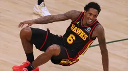 The Atlanta Hawks Lou Williams is knocked to the hardwood during the opening minutes against the Milwaukee Bucks during the first quarter in Game 5 of the Eastern Conference Finals on Thursday, July 1, 2021, at Fiserv Forum in Milwaukee.