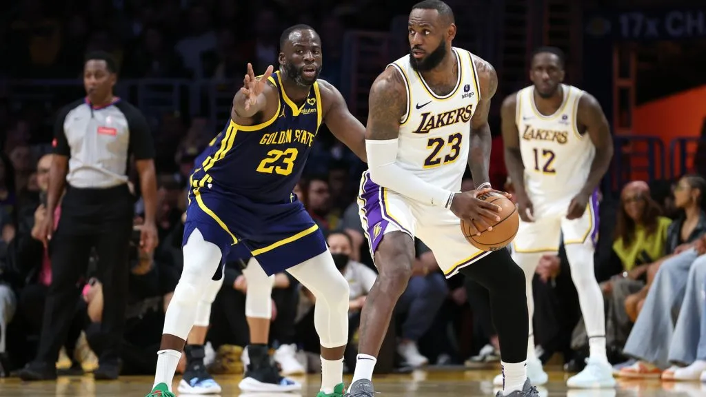 Draymond Green #23 of the Golden State Warriors defends against LeBron James #23 of the Los Angeles Lakers during the first half of a game at Crypto.com Arena. (Sean M. Haffey/Getty Images)