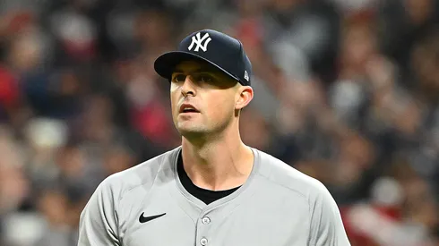 Clay Holmes #35 of the New York Yankees reacts after allowing a run in the seventh inning against the Cleveland Guardians during Game Four of the American League Championship Series at Progressive Field on October 18, 2024 in Cleveland, Ohio.