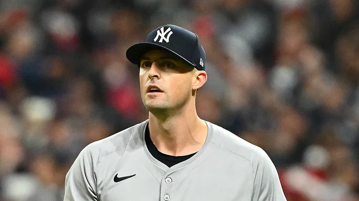 Clay Holmes #35 of the New York Yankees reacts after allowing a run in the seventh inning against the Cleveland Guardians during Game Four of the American League Championship Series at Progressive Field on October 18, 2024 in Cleveland, Ohio.