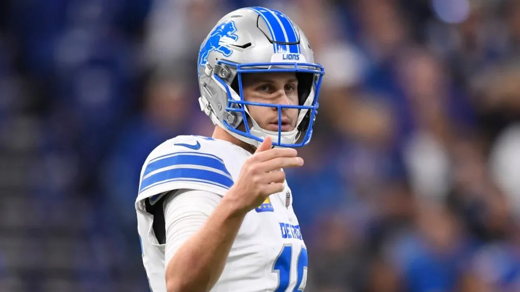 Detroit Lions Quarterback Jared Goff (16) sets up a play during the NFL, American Football Herren, USA football game between the Detroit Lions and the Indianapolis Colts on November 24, 2024, at Lucas Oil Stadium in Indianapolis, Indiana.