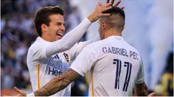 Riqui Puig 10 of the LA Galaxy congratulates Gabriel Pec
