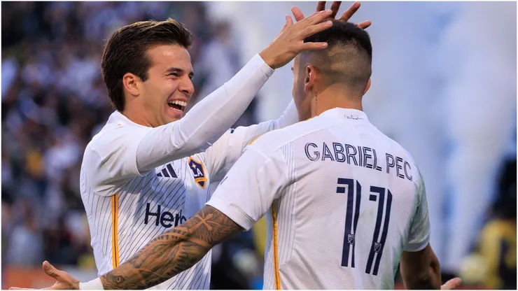 Riqui Puig 10 of the LA Galaxy congratulates Gabriel Pec
