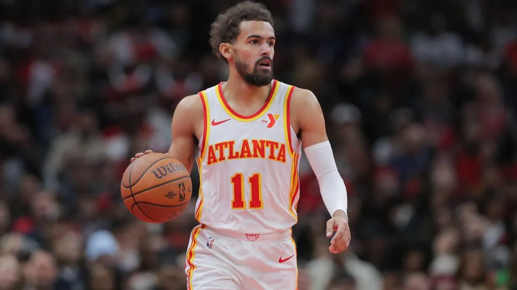 Trae Young 11 of the Atlanta Hawks brings the ball up court during the first half against the Chicago Bulls.
