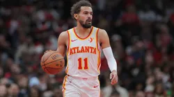 Trae Young 11 of the Atlanta Hawks brings the ball up court during the first half against the Chicago Bulls.