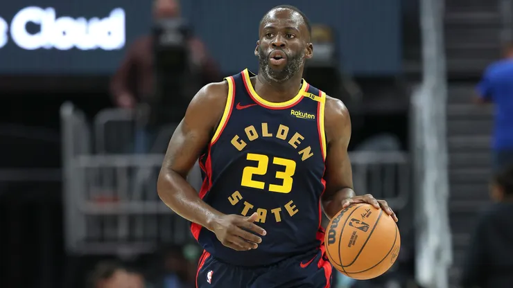 Draymond Green #23 of the Golden State Warriors dribbles the ball against the Brooklyn Nets at Chase Center