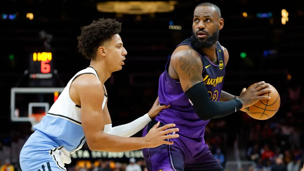 LeBron James #23 of the Los Angeles Lakers battles Jalen Johnson #1 of the Atlanta Hawks during the first quarter at State Farm Arena. (Todd Kirkland/Getty Images)