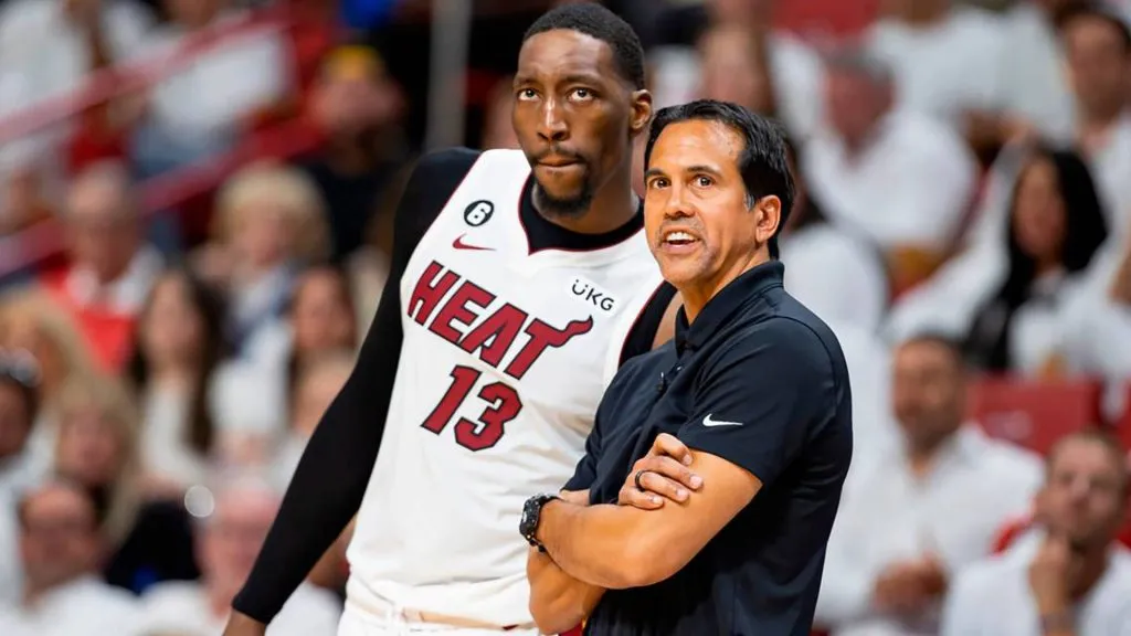 Bam Adebayo (13) and head coach Erik Spoelstra talk on the sidelines in the fourth quarter of Game 4 of the Eastern Conference semifinals at the Kaseya Center. (IMAGO / ZUMA Press Wire)