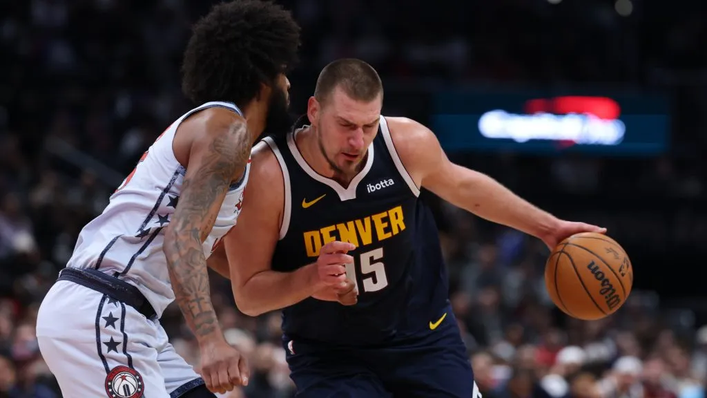 Nikola Jokic #15 of the Denver Nuggets dribbles the ball against the Washington Wizards during the second half at Capital One Arena. (Patrick Smith/Getty Images)