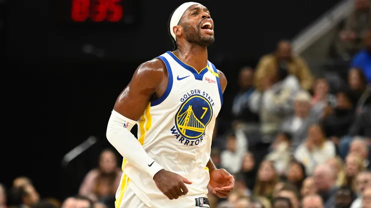 Buddy Hield #7 of the Golden State Warriors reacts to a play during the first half of a game against the Utah Jazz at Delta Center