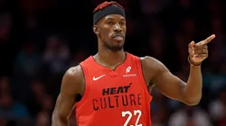 Jimmy Butler #22 of the Miami Heat reacts following a basket during the second half of the game against the Charlotte Hornets at Spectrum Center on November 27, 2024 in Charlotte, North Carolina.