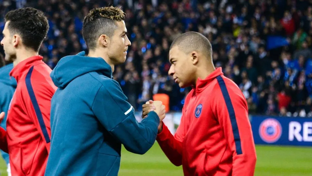 Mbappe shakes hands with Cristiano Ronaldo
