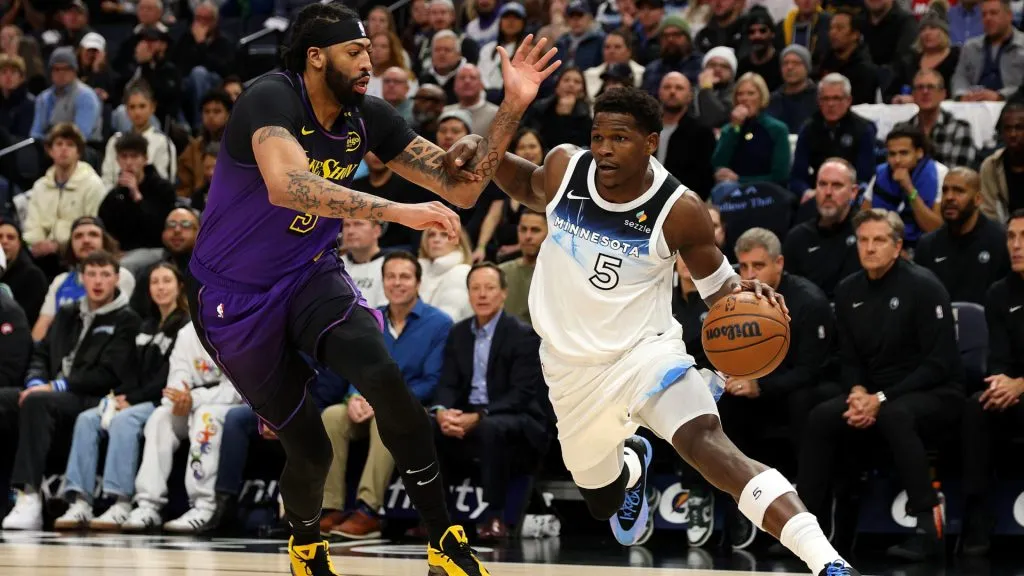 Anthony Edwards #5 of the Minnesota Timberwolves goes to the basket against Anthony Davis #3 of the Los Angeles Lakers in the first quarter at Target Center. (David Berding/Getty Images)