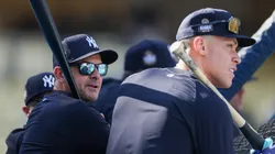 Aaron Boone #17 and Aaron Judge #99 of the New York Yankees look on during batting practice ahead of Game Two of the 2024 World Series between the Los Angeles Dodgers and the New York Yankees at Dodger Stadium on October 26, 2024 in Los Angeles, California.