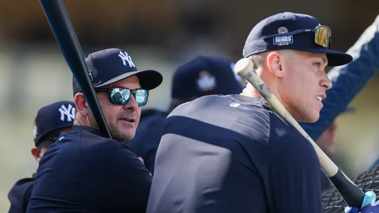 Aaron Boone #17 and Aaron Judge #99 of the New York Yankees look on during batting practice ahead of Game Two of the 2024 World Series between the Los Angeles Dodgers and the New York Yankees at Dodger Stadium on October 26, 2024 in Los Angeles, California.