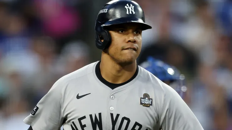 Juan Soto #22 of the New York Yankees flips his bat as he runs the bases after hitting a solo home run against the Los Angeles Dodgers in the third inning during Game Two of the 2024 World Series at Dodger Stadium on October 26, 2024 in Los Angeles, California.