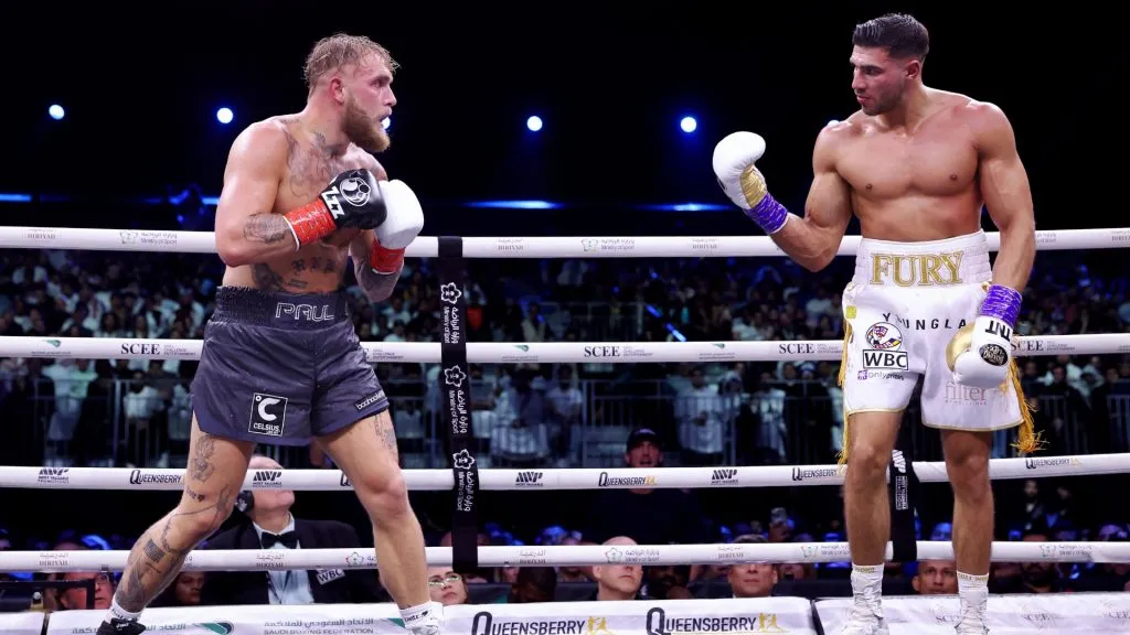 Jake Paul looks on as Tommy Fury taunts them during the Cruiserweight Title fight between Jake Paul and Tommy Fury at the Diriyah Arena on February 26, 2023 in Riyadh, Saudi Arabia. (Photo by Francois Nel/Getty Images)