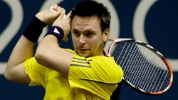 Robin Soderling of Sweden returns a shot during his singles match against Teimuraz Gabashvili.