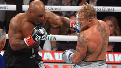Mike Tyson throws a left on Jake Paul during a heavyweight bout at AT&T Stadium on November 15, 2024 in Arlington, Texas.
