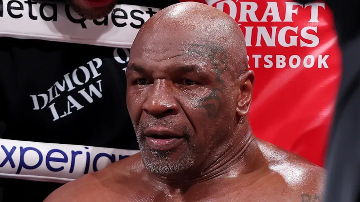 Mike Tyson sits in his corner between rounds against Jake Paul during LIVE On Netflix: Jake Paul vs. Mike Tyson at AT&T Stadium on November 15, 2024 in Arlington, Texas.