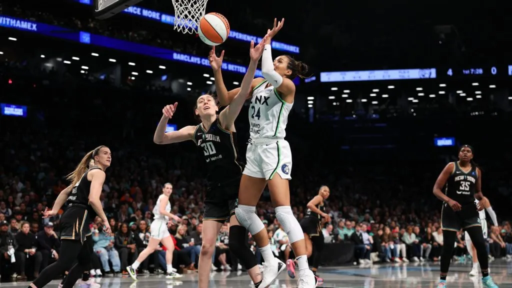Napheesa Collier #24 of the Minnesota Lynx shoots the ball against Breanna Stewart #30 of the New York Liberty during the first half of Game Five of the WNBA Finals at Barclays Center on October 20, 2024. (Source: Elsa/Getty Images)