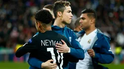 Cristiano Ronaldo (L) of Real Madrid CF hugs Neymar JR (R) of Paris Saint-Germain prior to start the UEFA Champions League Round of 16 First Leg match between Real Madrid and Paris Saint-Germain at Estadio Santiago Bernabeu on February 14, 2018 in Madrid, Spain.