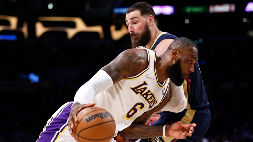 LeBron James #6 of the Los Angeles Lakers drives against Jonas Valanciunas #17 of the New Orleans Pelicans during the first half at Crypto.com Arena. (Michael Owens/Getty Images)