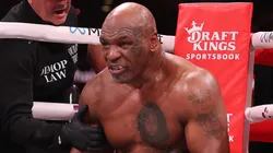 Mike Tyson sits in his corner between rounds against Jake Paul during LIVE On Netflix: Jake Paul vs. Mike Tyson at AT&T Stadium on November 15, 2024 in Arlington, Texas.