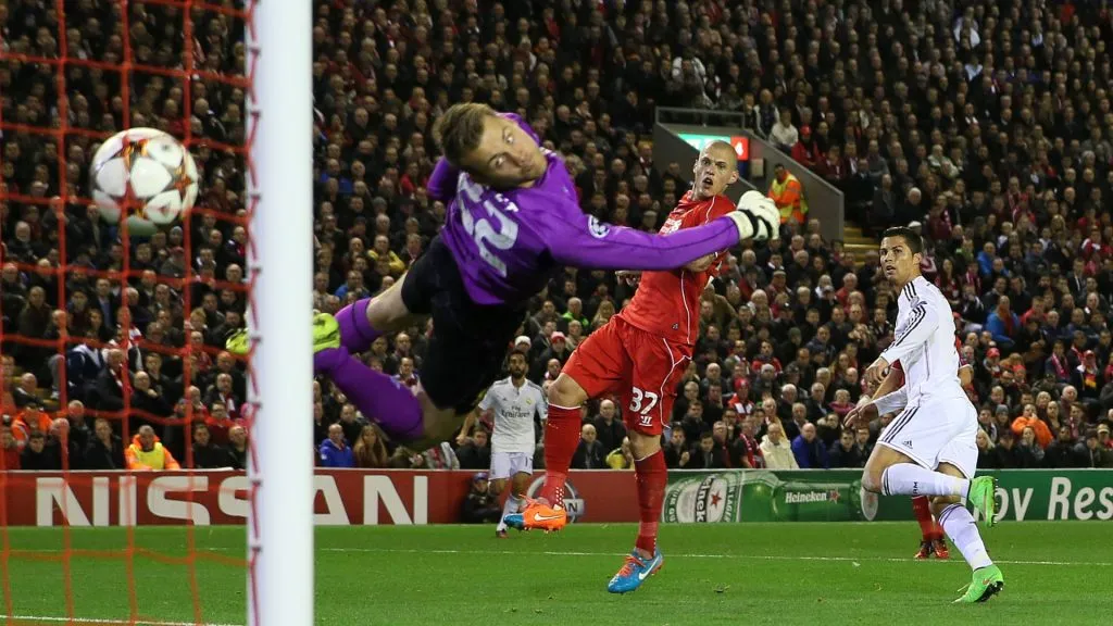 OCT 22 Oct. 22, 2014 - Liverpool, United Kingdom - Cristiano Ronaldo of Real Madrid scores the first goal past Simon Mignolet of Liverpool - UEFA Champions League Group B - Liverpool vs Real Madrid - Anfield Stadium