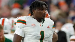 Miami Hurricanes quarterback CAM WARD (1) discusses the game on the sideline during the ACC conference football game between Syracuse and Miami played at the JMA Wireless Dome on the campus of Syracuse University.