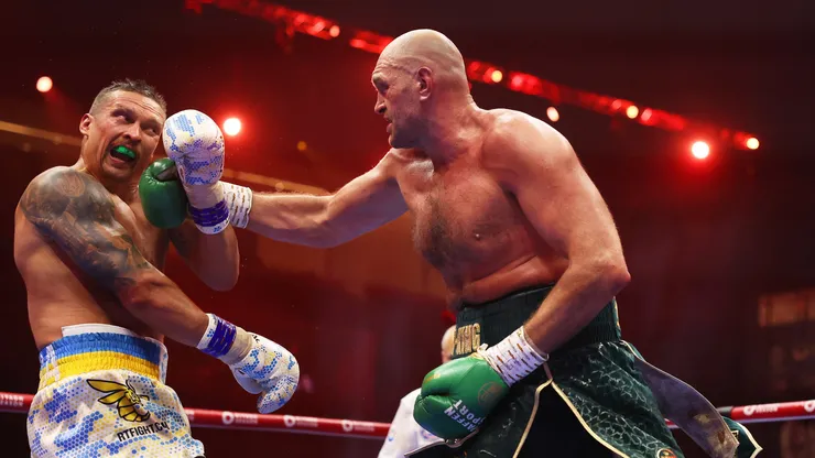 Tyson Fury punches Oleksandr Usyk during the IBF, WBA, WBC, WBO and Undisputed Heavyweight titles' fight between Tyson Fury and Oleksandr Usyk