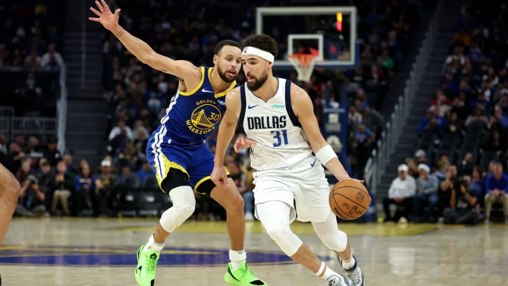Klay Thompson #31 of the Dallas Mavericks is guarded by Stephen Curry #30 of the Golden State Warriors in the first half at Chase Center. (Ezra Shaw/Getty Images)