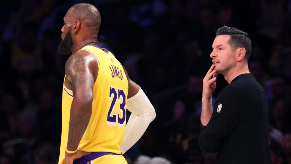 LeBron James #23 of the Los Angeles Lakers and head coach JJ Redick look on during the third quarter against the Minnesota Timberwolves at Crypto.com Arena. (Harry How/Getty Images)