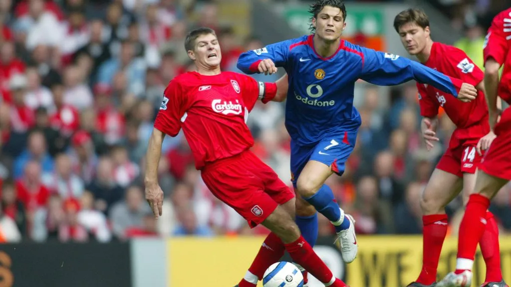 Steven Gerrard of Liverpool tackles Cristiano Ronaldo of Manchester United during the FA Cup fifth round match between Liverpool and Manchester United. (IMAGO / Allstar)