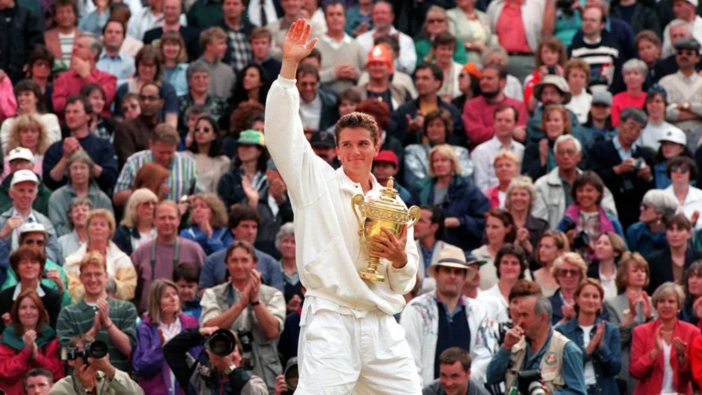 Richard Krajicek of Holland holds the trophy aloft after his victory in the Men’s Singles event at Wimbledon in London. (IMAGO / Action Plus)
