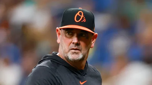 Manager Brandon Hyde #18 of the Baltimore Orioles looks on during the seventh inning against the Tampa Bay Rays at Tropicana Field on August 11, 2024 in St Petersburg, Florida.