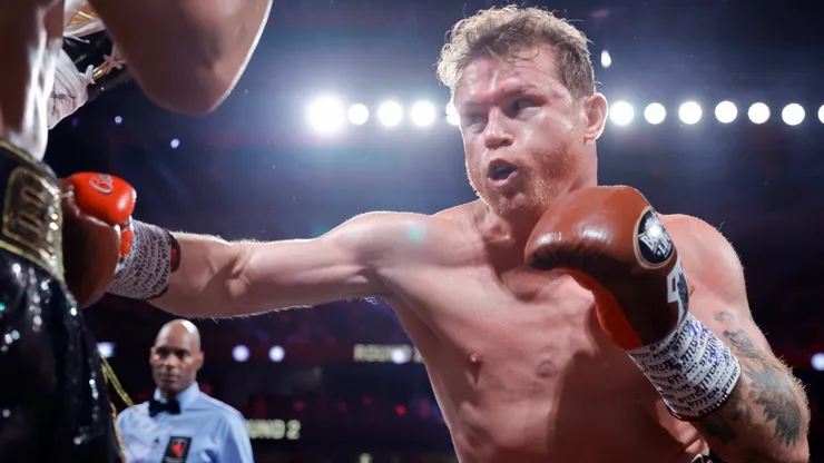 WBC/WBA/WBO super middleweight champion Canelo Alvarez punches Edgar Berlanga during the second round of a title fight at T-Mobile Arena on September 14, 2024 in Las Vegas, Nevada.